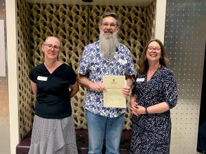 Professor Derek Leinweber from the School of Physical Sciences receives an Executive Dean’s Commendation for Excellence in Teaching from Professors Amanda Able and Laura Parry.